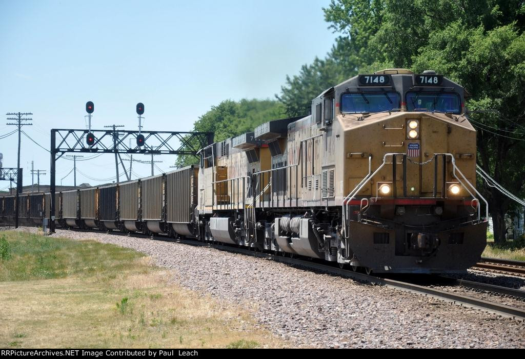 Loaded coal train rolls east